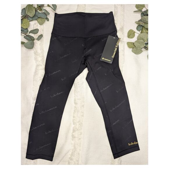 Lululemon Wunder Train HR  21" Crop Legging Logo in Black - Picture 1 of 5